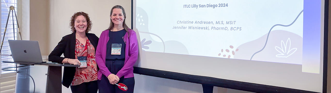 Christine Andresen, MLS, MSIT, and Jennifer Wisniewski, PharmD, BCPS, at their presentation at the ITLC Lilly Conference in January 2024, taken by Gretchen Seif, PT, DPT.