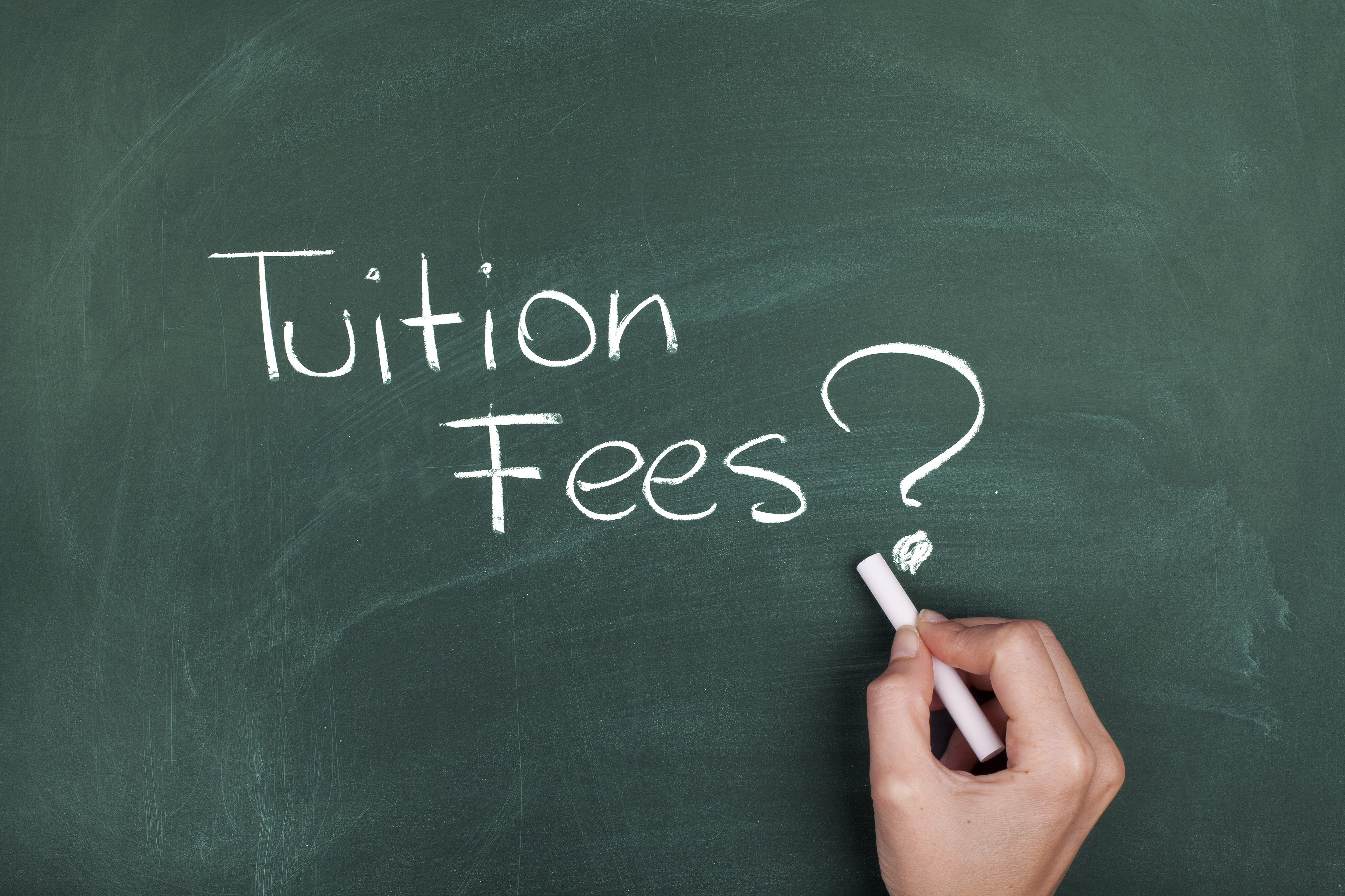 Tuition and Fees written on a chalkboard