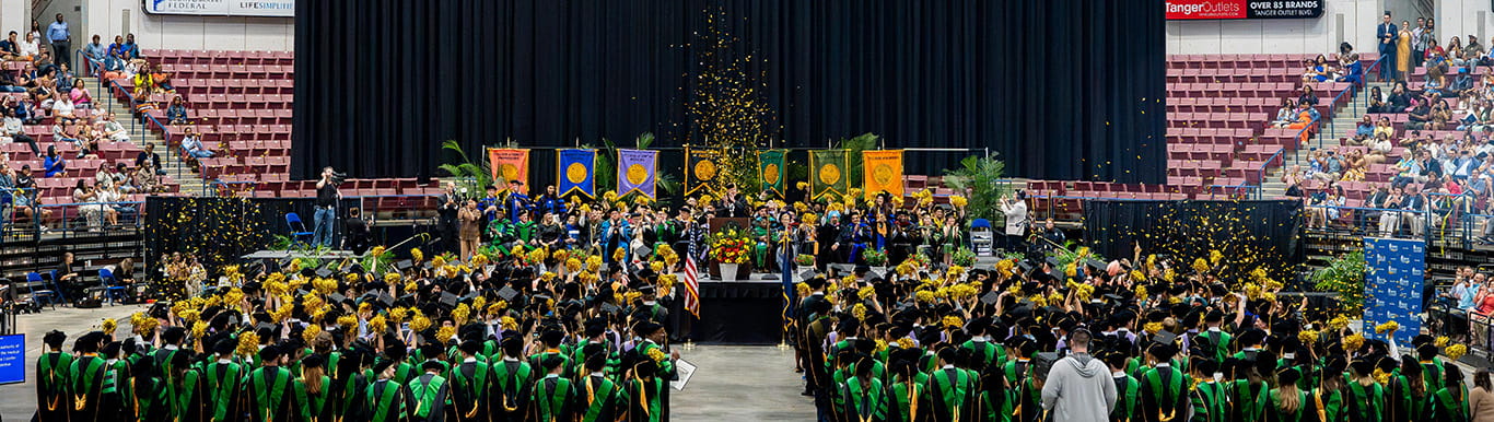 2024 MUSC Commencement ceremony in the North Charleston Coliseum, confetti flying