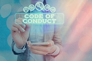 Code of conduct being selected on a screen in front of viewer, blue and pink overlayed colors