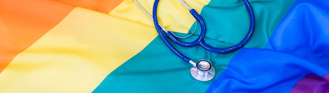 photo of stethoscope on pride flag