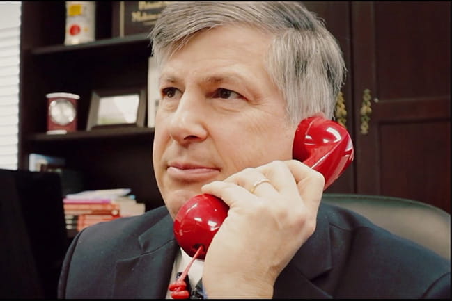 Dr. Hall answers the red phone