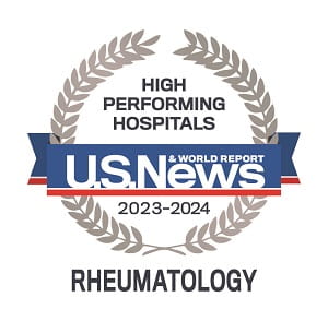 Badge that says High Performing Hospitals | US News and World Report | 2023 through 2024 | Rheumatology