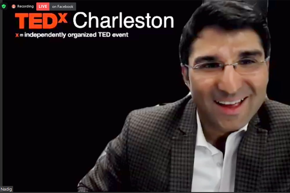 A screenshot of Satish Nadig in the virtual TEDx presentation