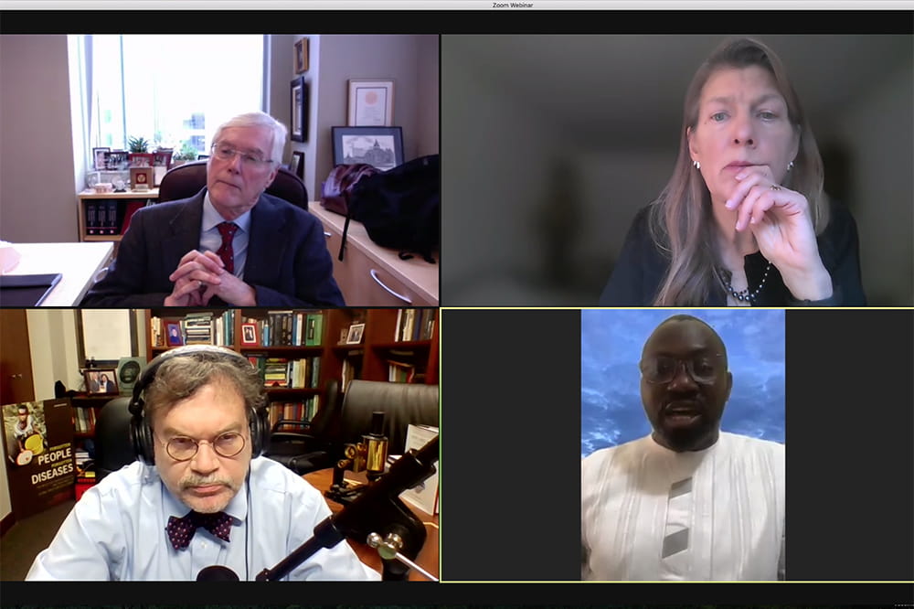 Screenshot of four people talking during a Zoom panel discussion